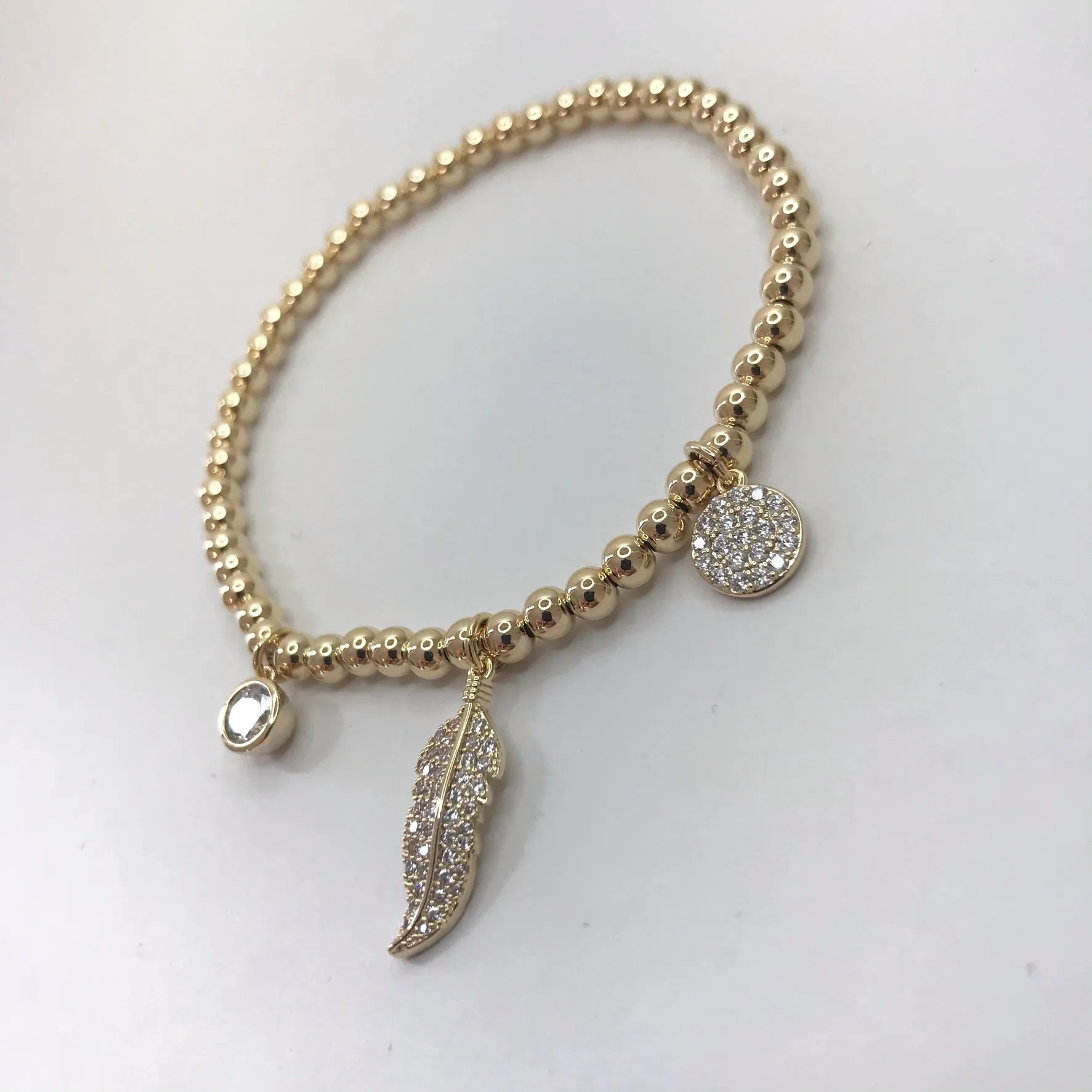 Absolute Floaty Feather Bracelet - Gold