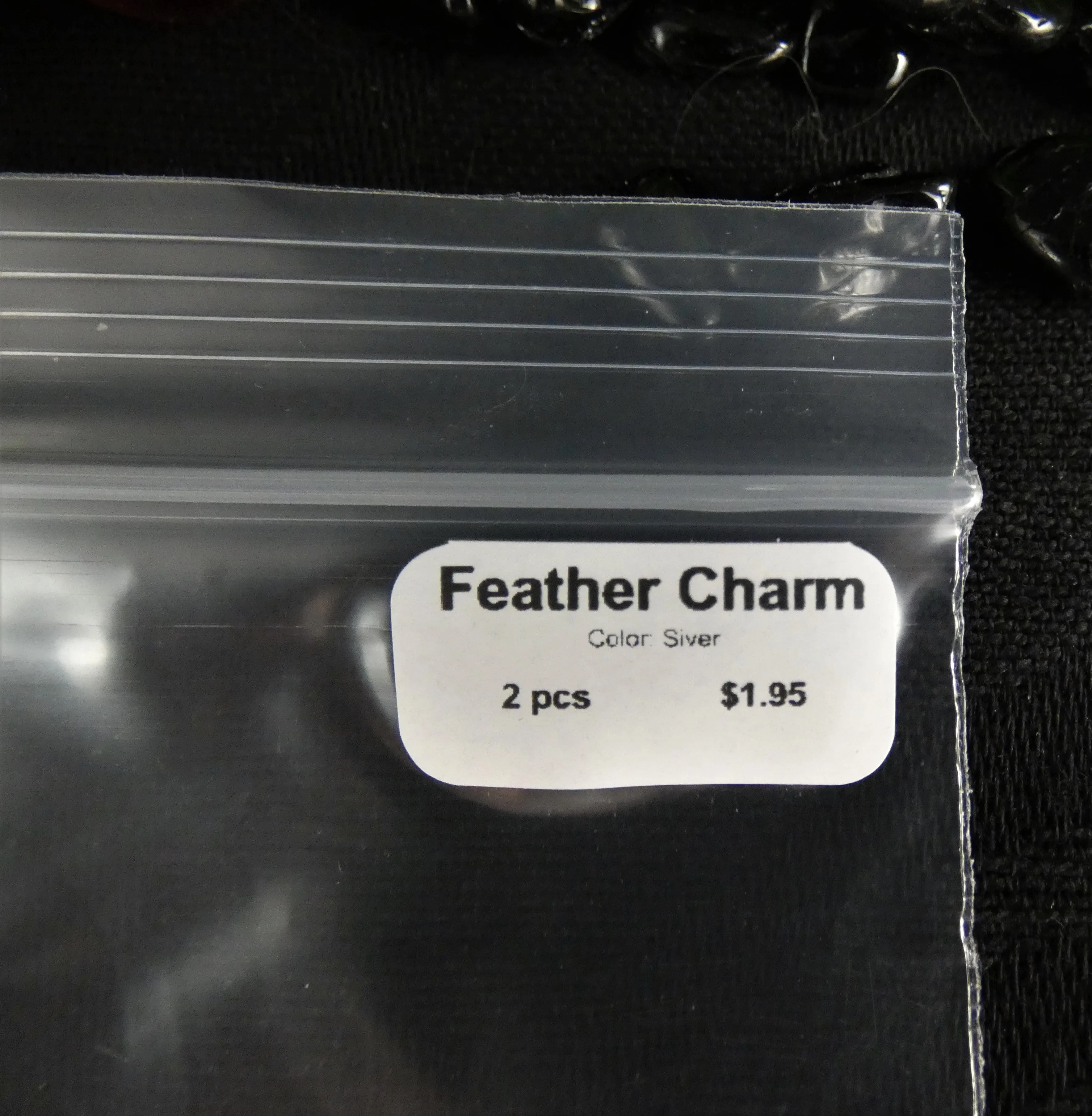Feather Charm