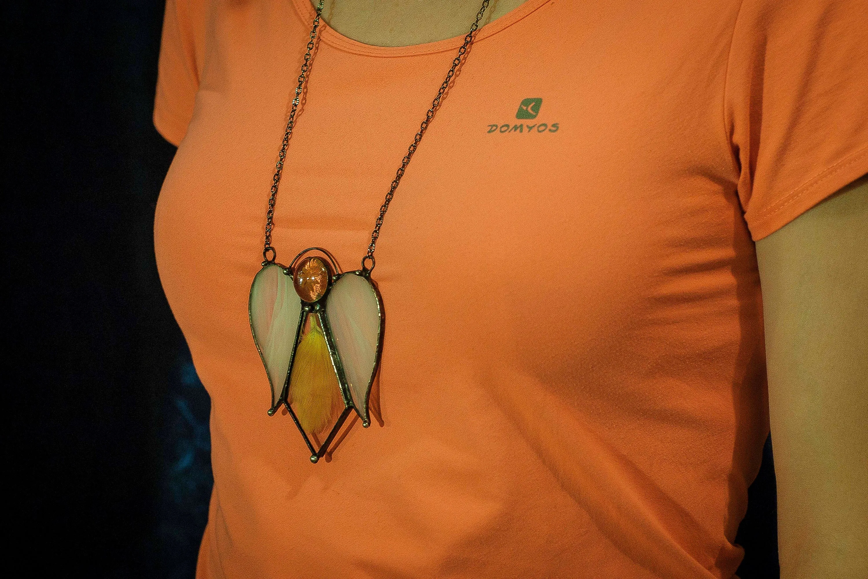 Glass Angel Necklace with a feather between two glass
