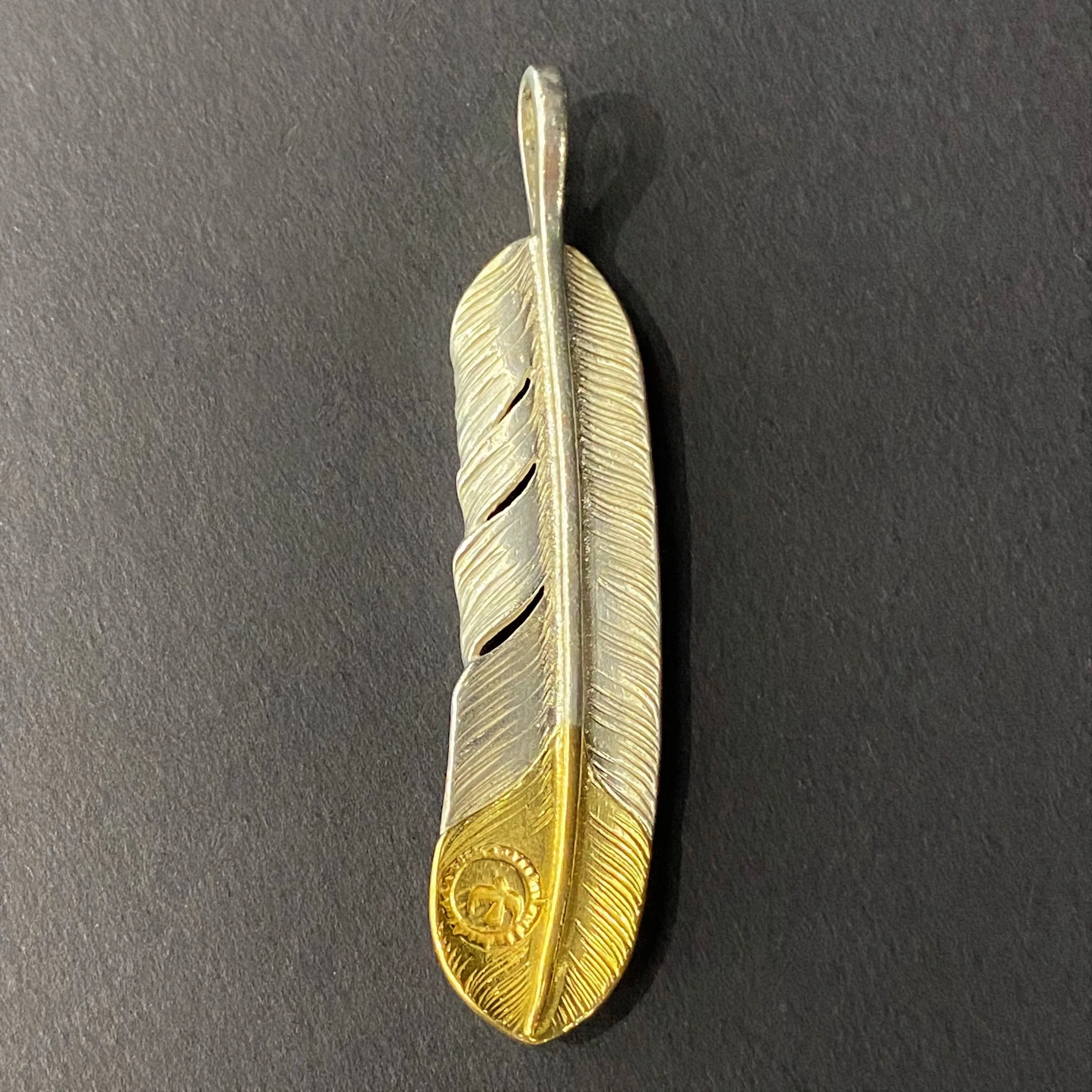 Goros Gold Tip Feather - Facing Left