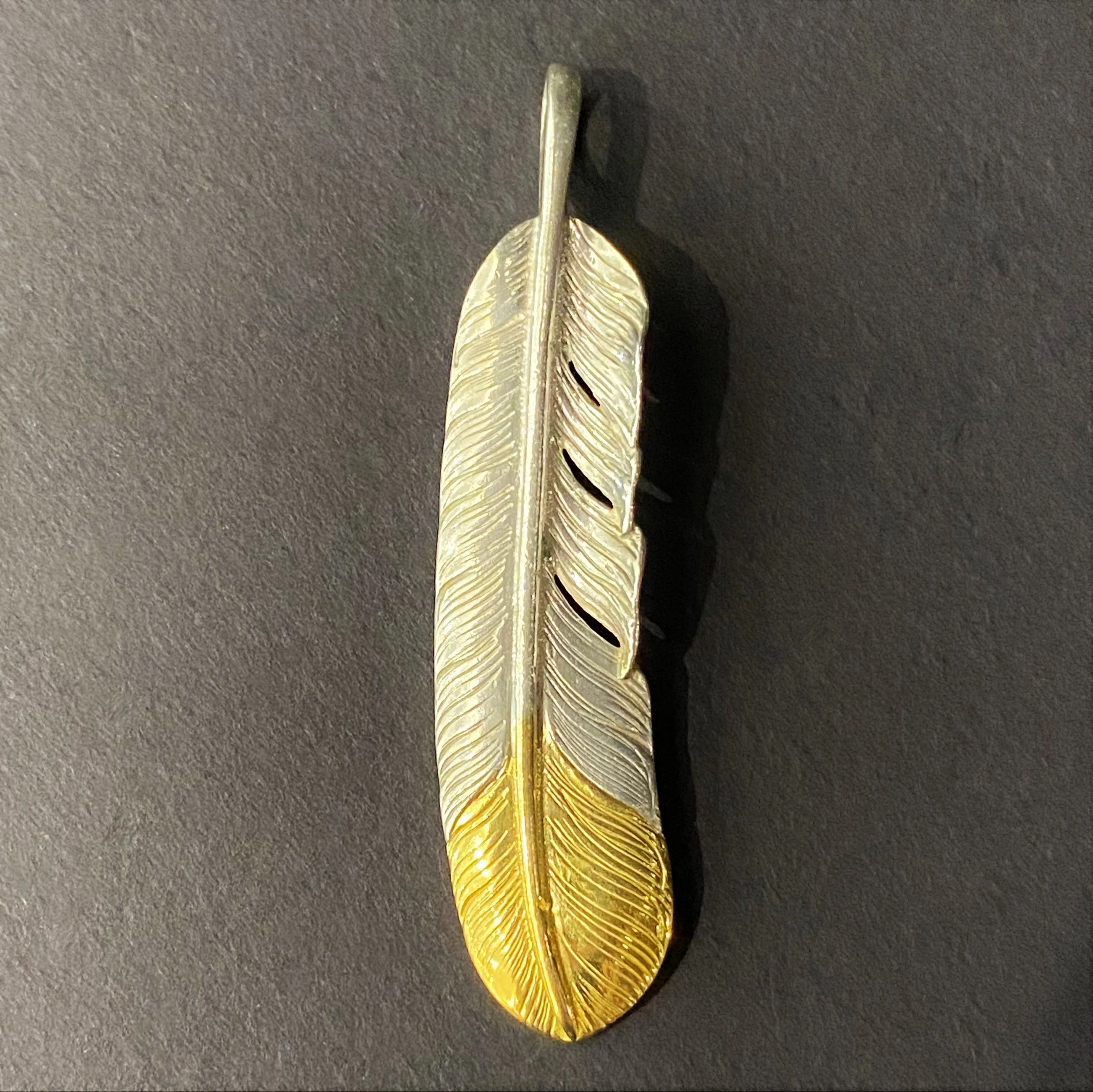 Goros Gold Tip Feather - Facing Left