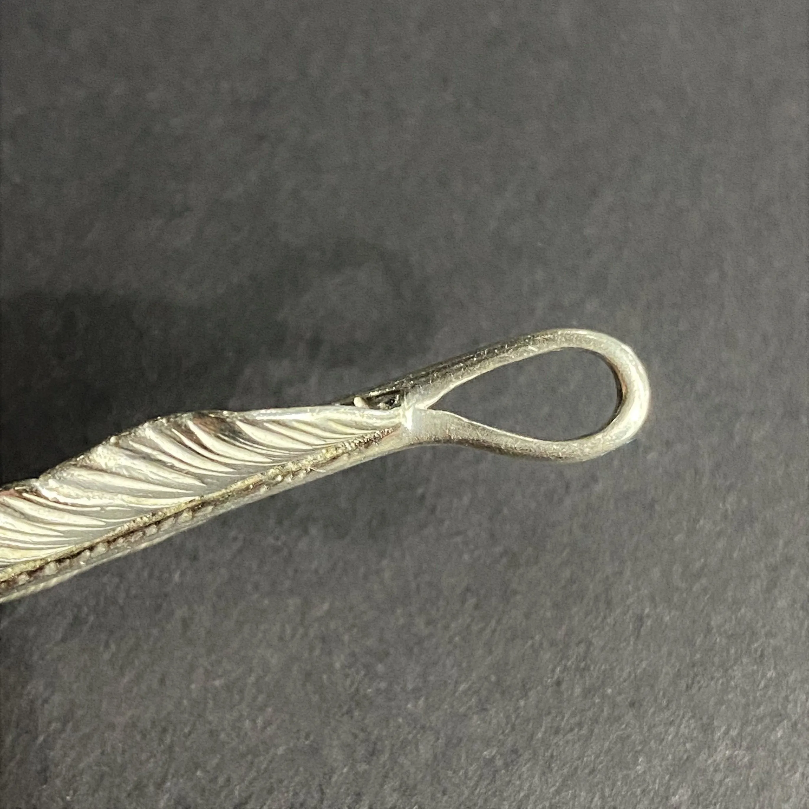 Goros Gold Tip Feather - Facing Left