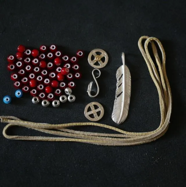 Goros Silver Feather And Red Beads Setup