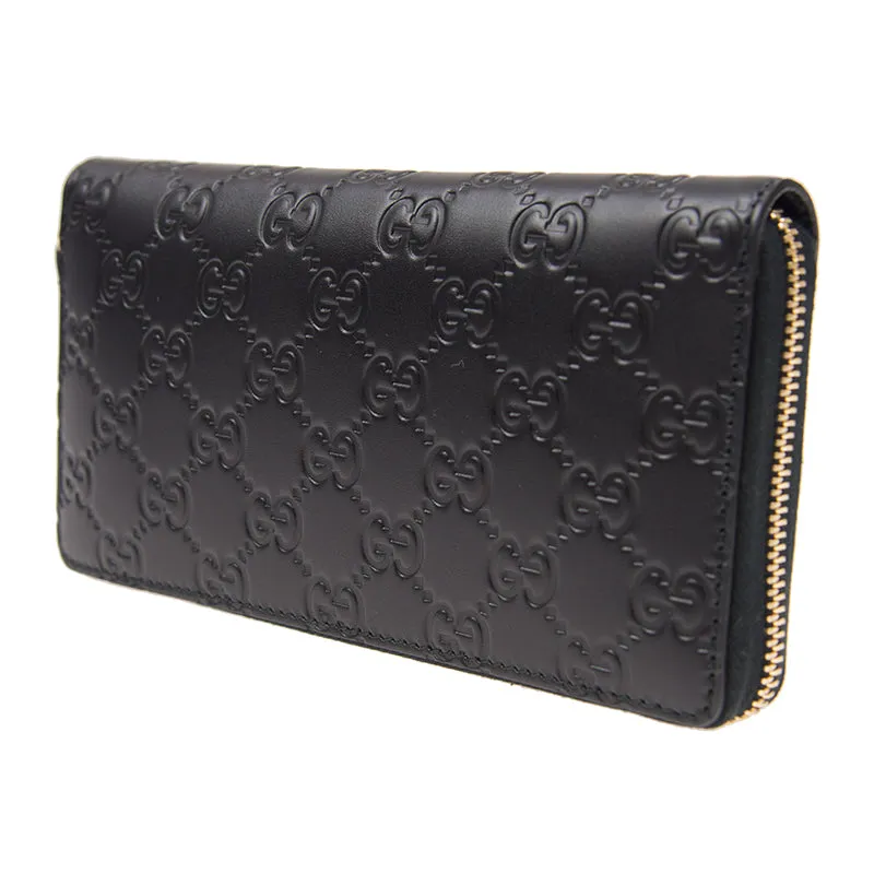 Gucci Interlocking GG Embossed Leather Zip Around Wallet in Black