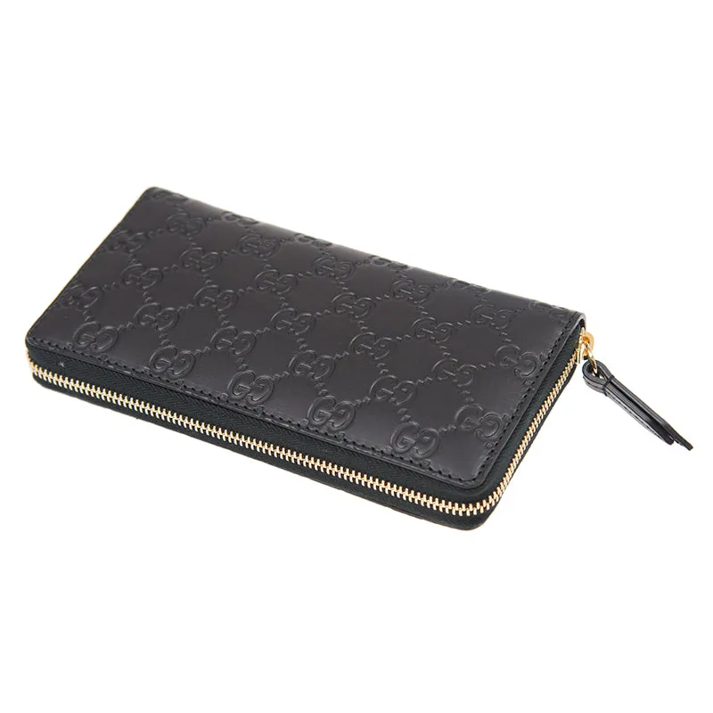 Gucci Interlocking GG Embossed Leather Zip Around Wallet in Black