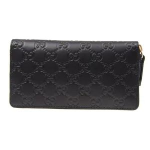 Gucci Interlocking GG Embossed Leather Zip Around Wallet in Black