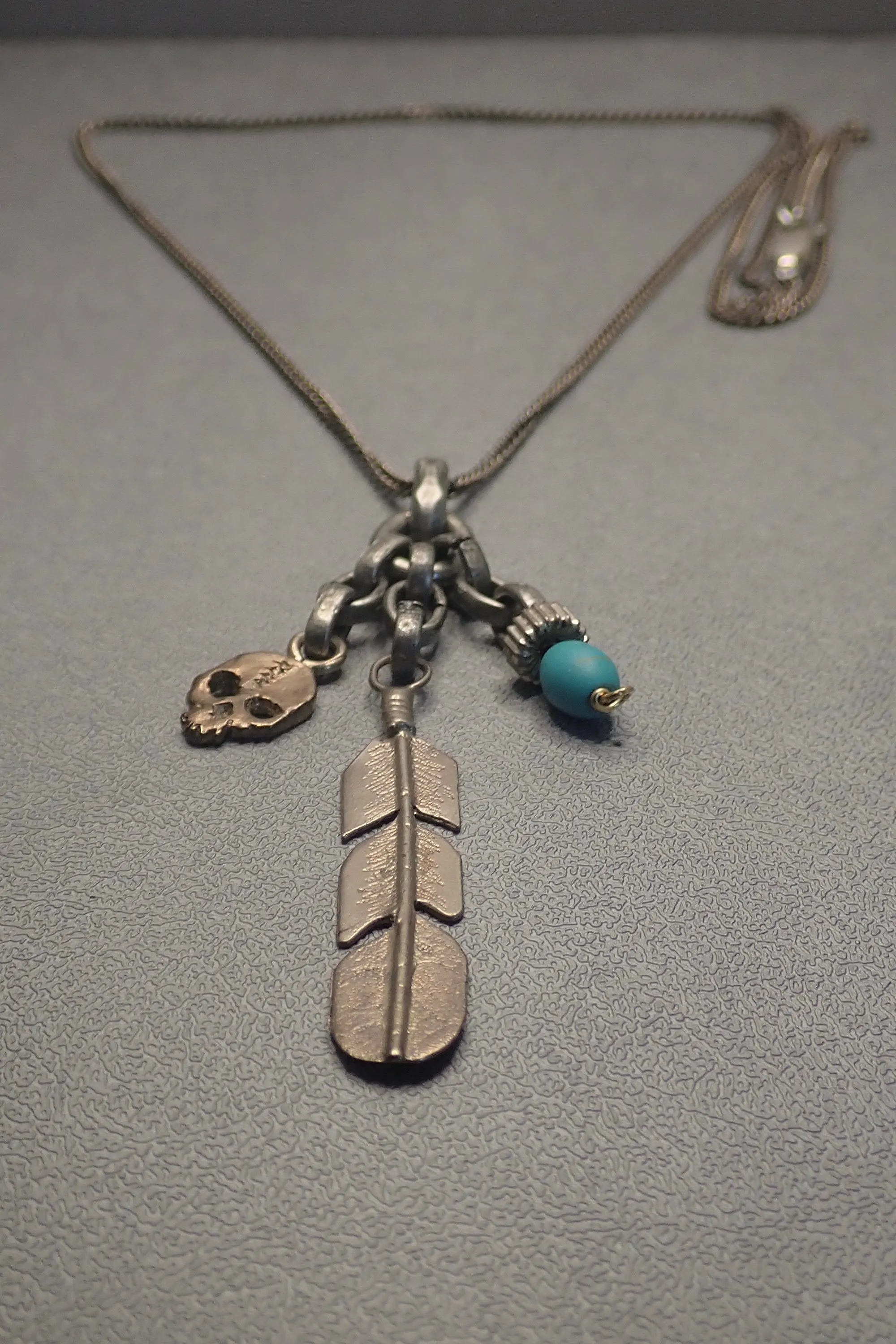 SKULL & FEATHER PENDANT