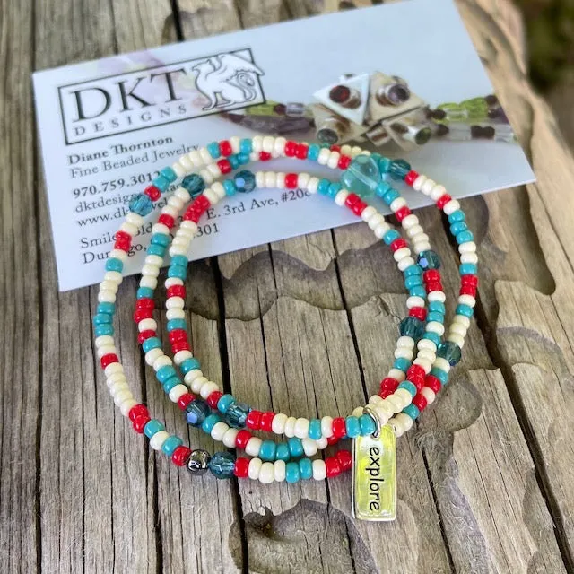Stretch necklace or triple wrap bracelet with sterling explore charm