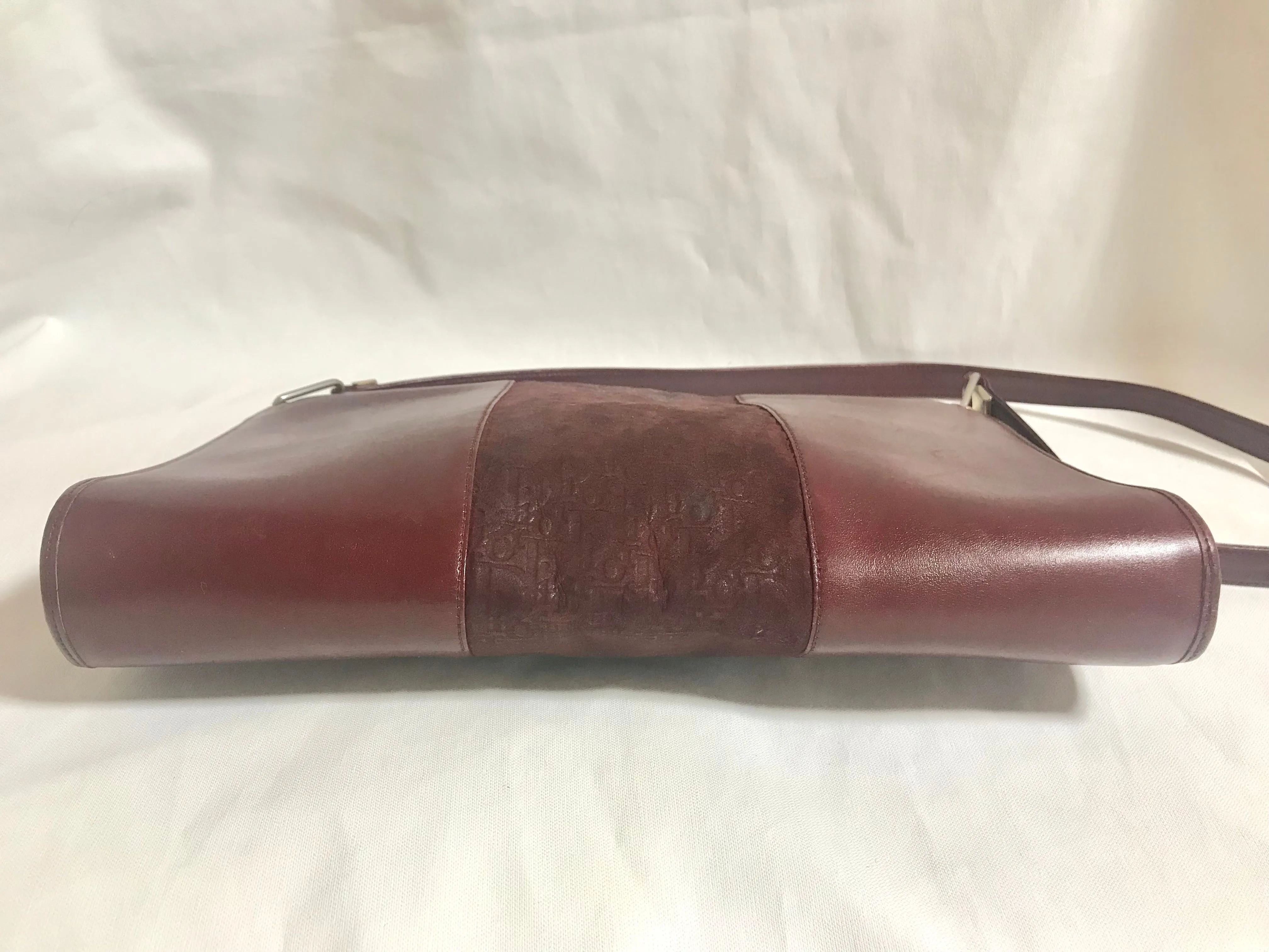 Vintage Christian Dior wine red leather clutch shoulder bag with engraved logo at center. Classic and beautiful purse. 060905r4