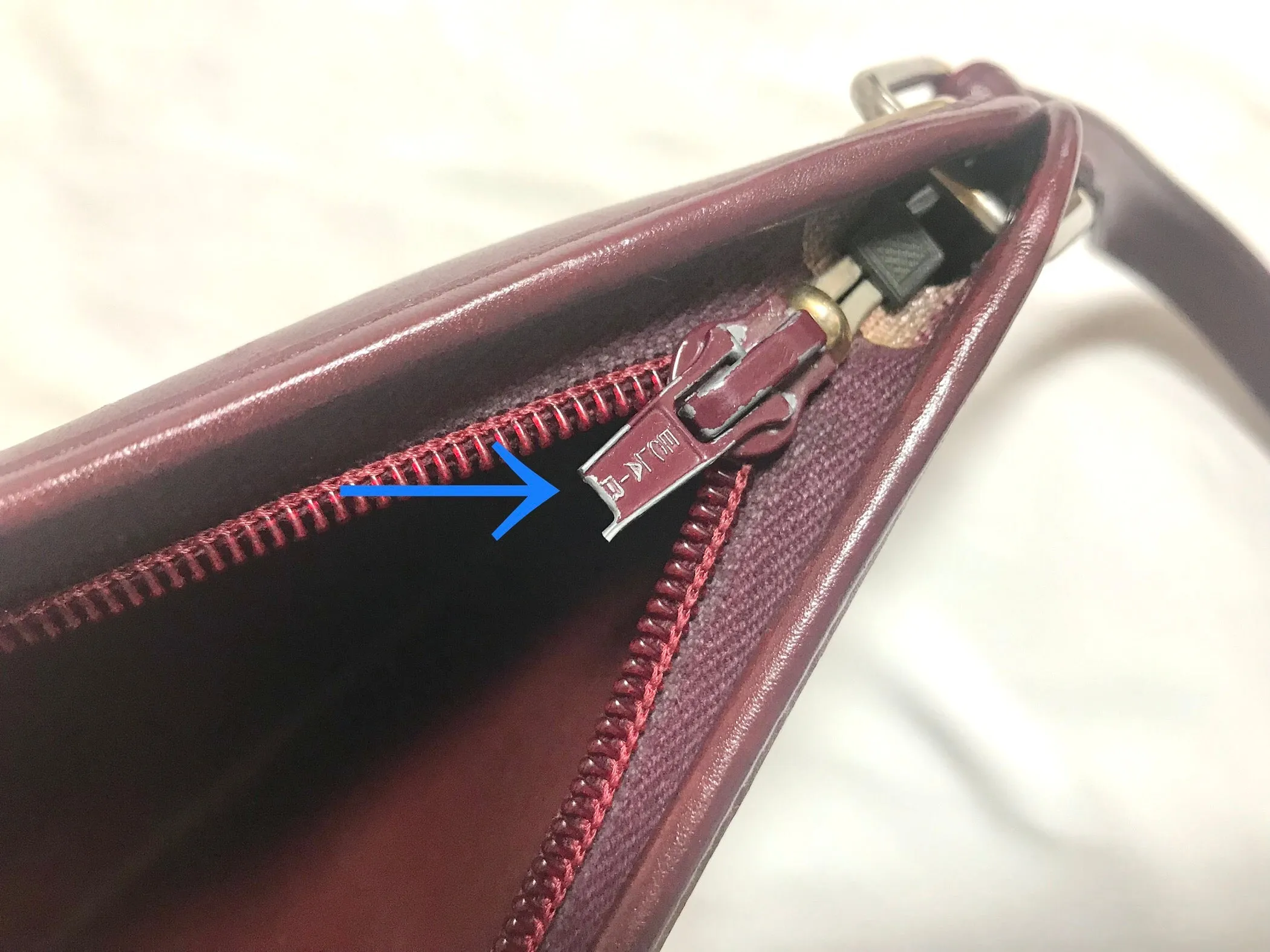 Vintage Christian Dior wine red leather clutch shoulder bag with engraved logo at center. Classic and beautiful purse. 060905r4