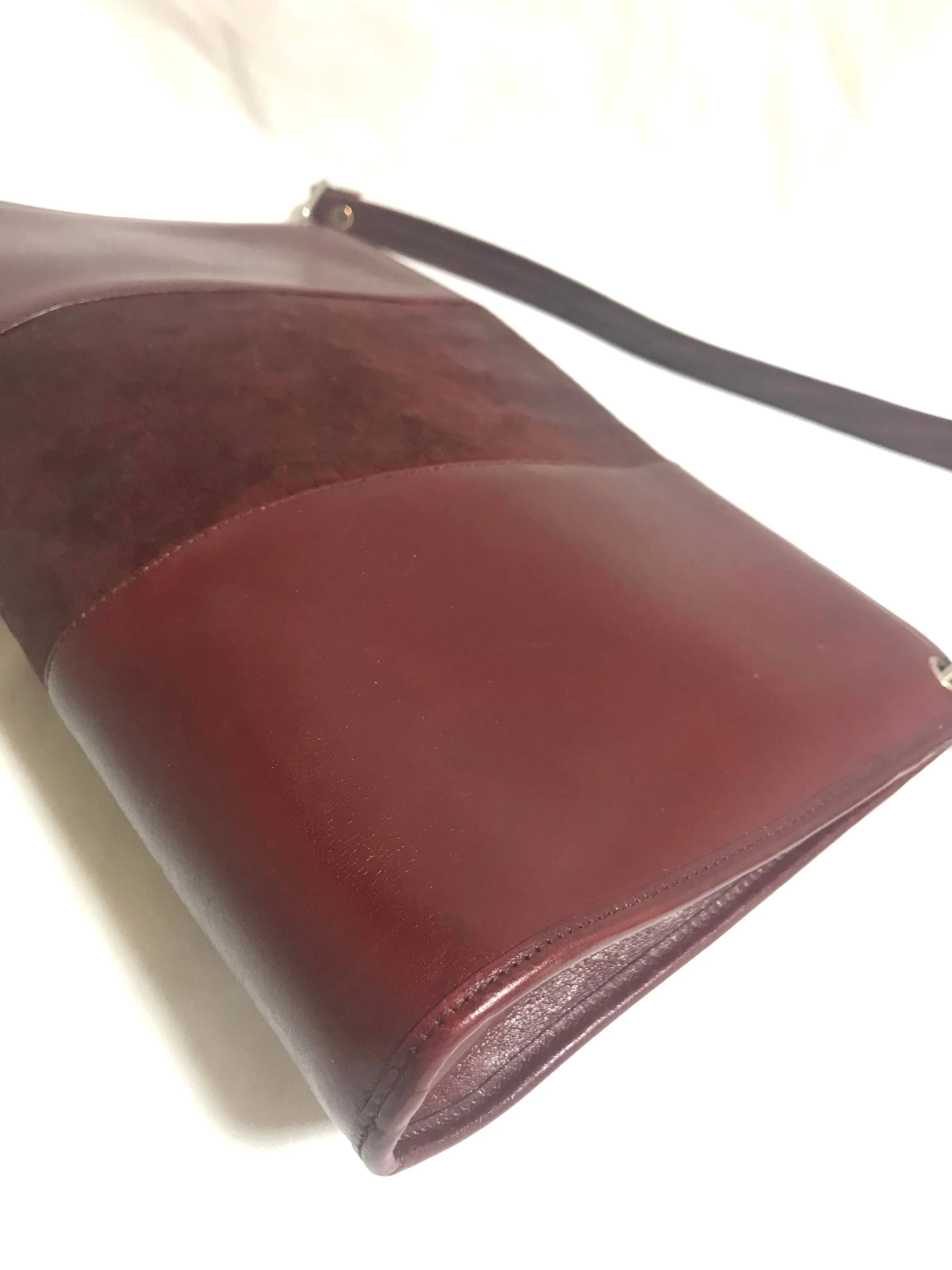 Vintage Christian Dior wine red leather clutch shoulder bag with engraved logo at center. Classic and beautiful purse. 060905r4