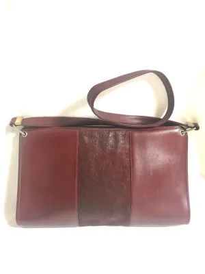 Vintage Christian Dior wine red leather clutch shoulder bag with engraved logo at center. Classic and beautiful purse. 060905r4