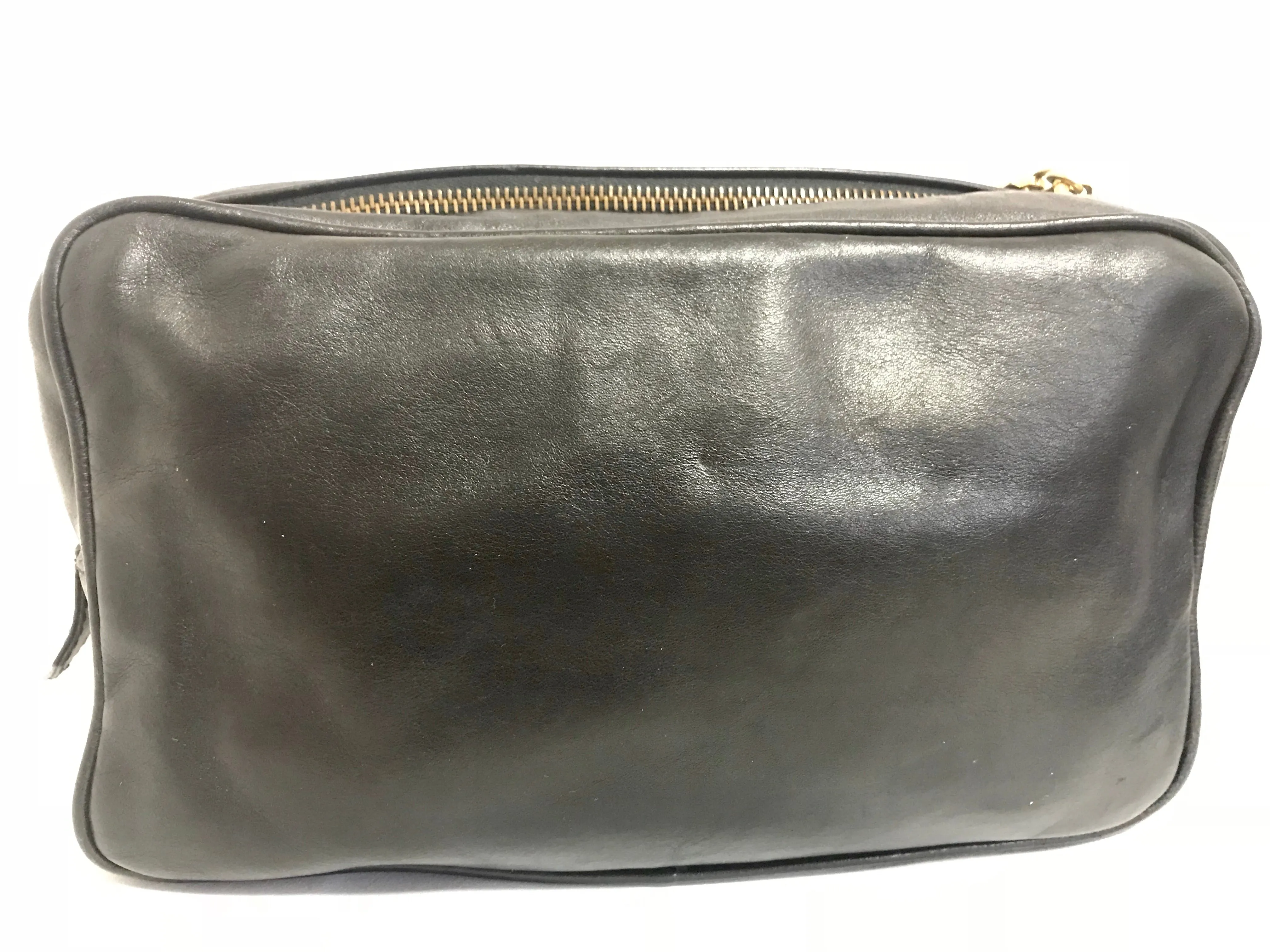 Vintage Gianni Versace black leather purse pouch, case bag with its iconic medusa face and golden logo motif charm. Unisex bag. 061122re1