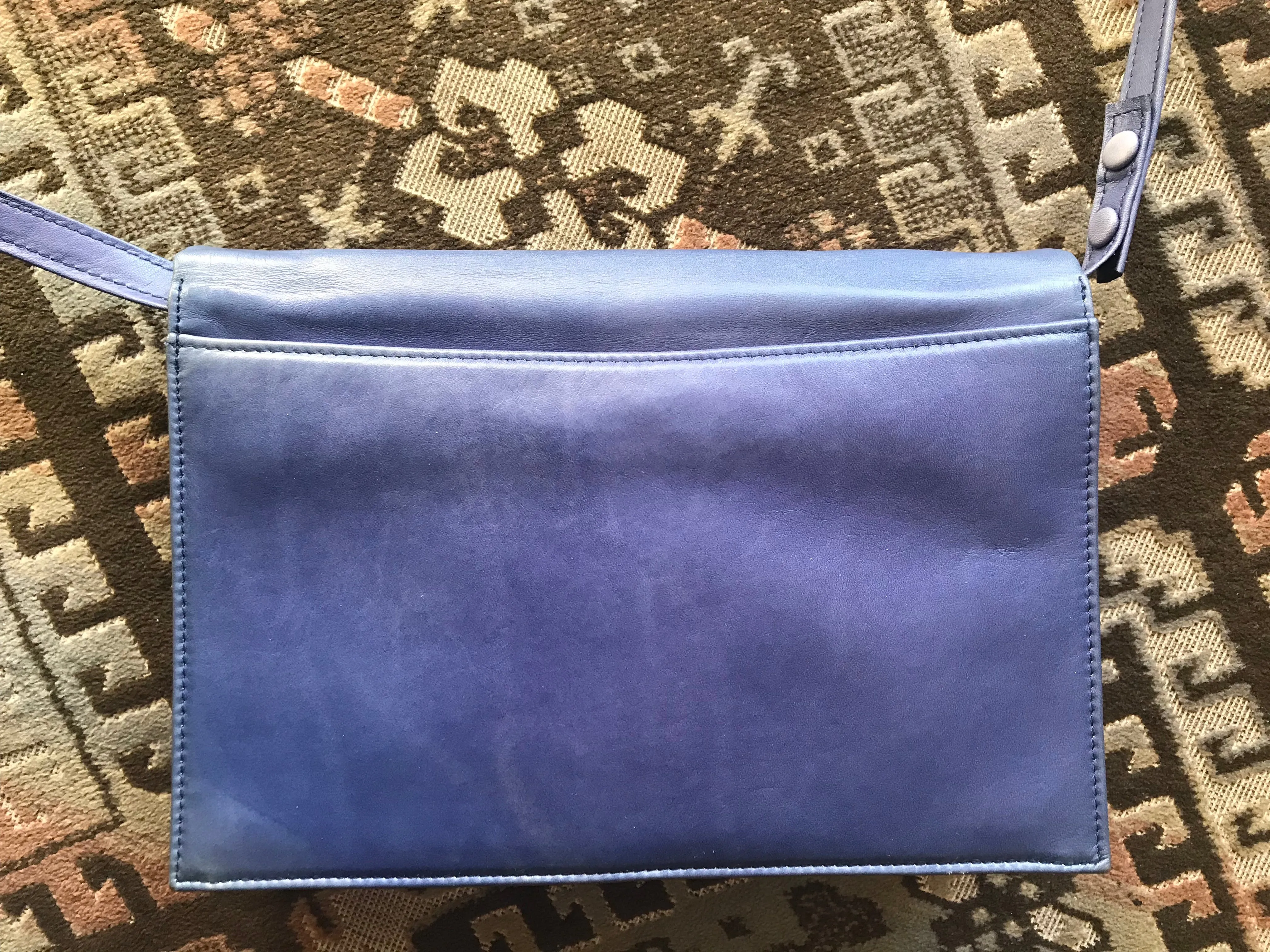 Vintage Valentino Garavani blue leather clutch shoulder bag with brown and golden logo plate at front. Gathered design.