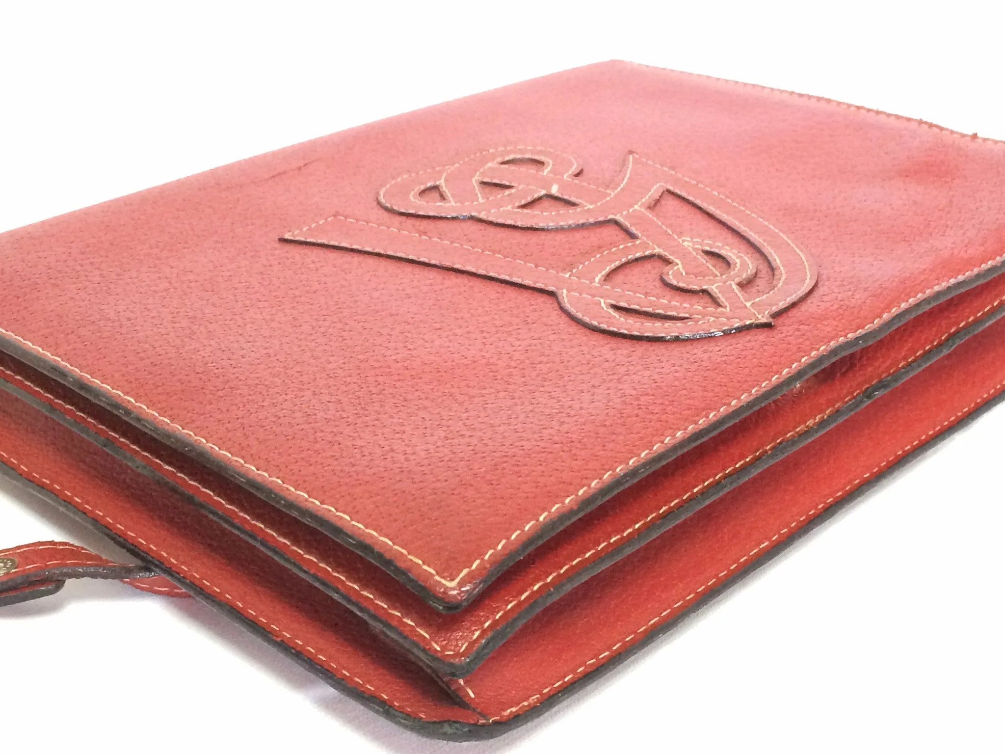 Vintage Valentino Garavani red pigskin shoulder clutch bag with unique logo stitch mark.