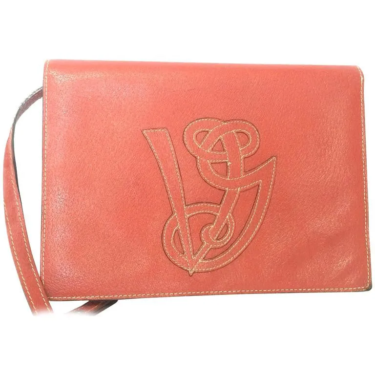 Vintage Valentino Garavani red pigskin shoulder clutch bag with unique logo stitch mark.